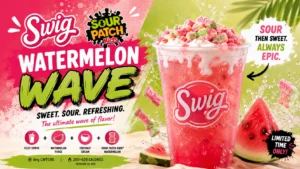 A refreshing Swig Sour Patch Kids Watermelon Wave beverage in a clear cup, showcasing its bright color and ice.